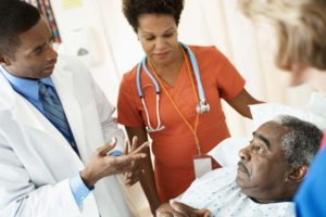 Doctor Talking with Stroke Patient in Hospital